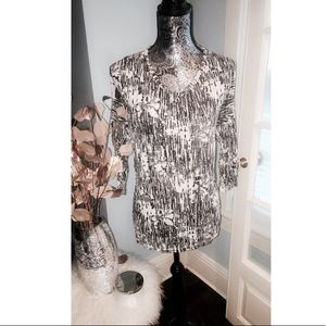 Black and white patterned top with cutout back